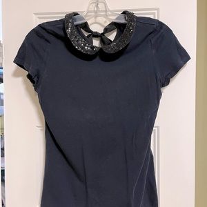 Cyrillus navy top with sequin collar -bow in the back